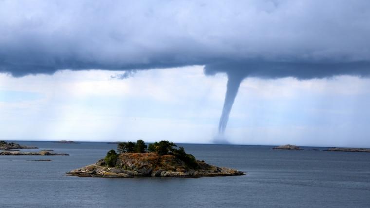Operational Resilience Leadership Webinar cover showing island with tornado in the distance